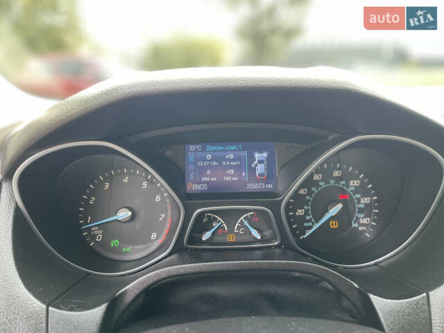 Красный Форд Фокус, объемом двигателя 2 л и пробегом 206 тыс. км за 6500 $, фото 14 на Automoto.ua