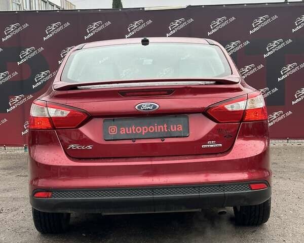 Красный Форд Фокус, объемом двигателя 2 л и пробегом 146 тыс. км за 8200 $, фото 9 на Automoto.ua