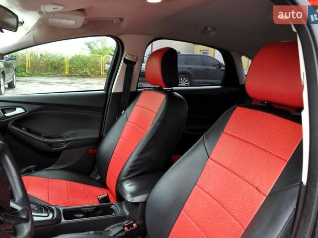 Червоний Форд Фокус, об'ємом двигуна 2 л та пробігом 207 тис. км за 6999 $, фото 18 на Automoto.ua