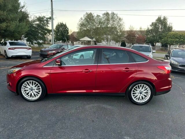 Красный Форд Фокус, объемом двигателя 2 л и пробегом 89 тыс. км за 6700 $, фото 3 на Automoto.ua