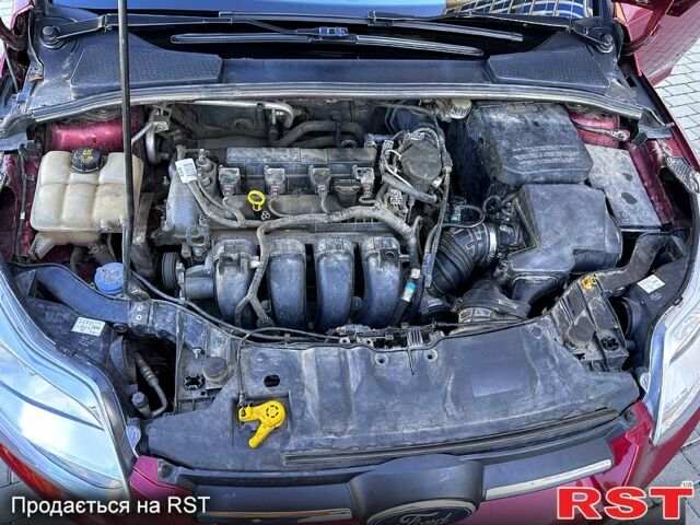 Червоний Форд Фокус, об'ємом двигуна 2 л та пробігом 204 тис. км за 7049 $, фото 4 на Automoto.ua