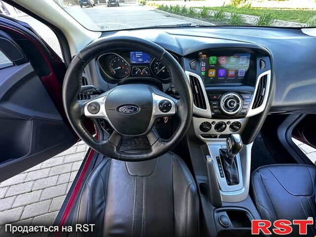 Червоний Форд Фокус, об'ємом двигуна 2 л та пробігом 204 тис. км за 7049 $, фото 2 на Automoto.ua