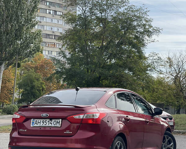 Красный Форд Фокус, объемом двигателя 2 л и пробегом 206 тыс. км за 6500 $, фото 2 на Automoto.ua