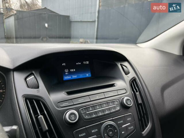 Красный Форд Фокус, объемом двигателя 2 л и пробегом 124 тыс. км за 8300 $, фото 18 на Automoto.ua