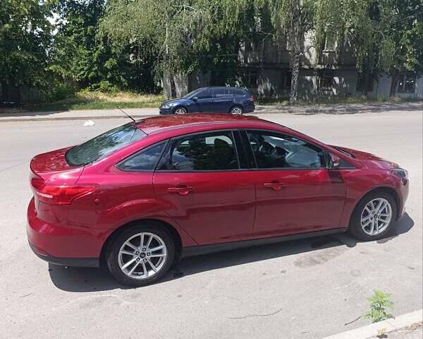 Червоний Форд Фокус, об'ємом двигуна 2 л та пробігом 126 тис. км за 8300 $, фото 2 на Automoto.ua