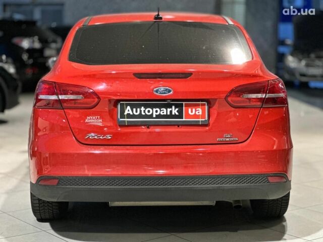 Червоний Форд Фокус, об'ємом двигуна 2 л та пробігом 162 тис. км за 9490 $, фото 4 на Automoto.ua