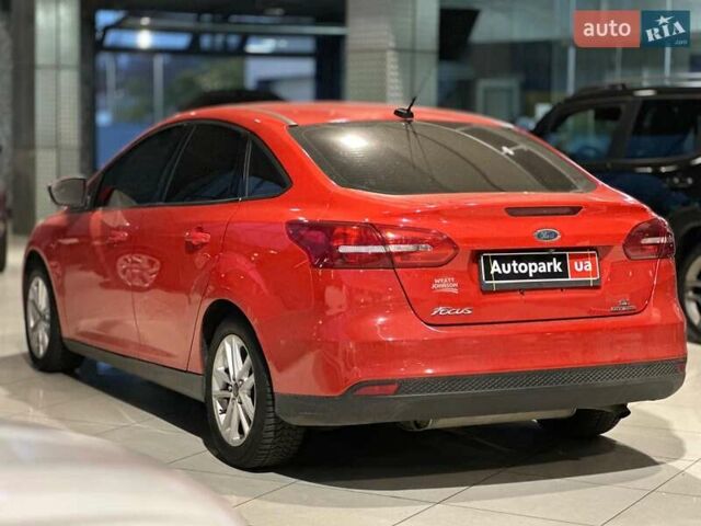 Червоний Форд Фокус, об'ємом двигуна 2 л та пробігом 162 тис. км за 9490 $, фото 4 на Automoto.ua