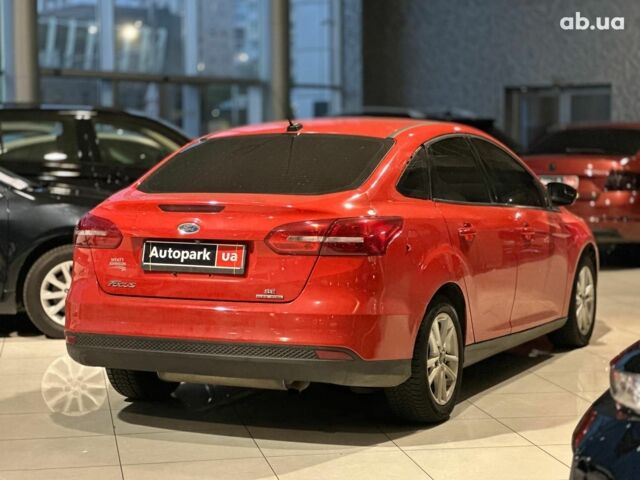Червоний Форд Фокус, об'ємом двигуна 2 л та пробігом 162 тис. км за 9490 $, фото 3 на Automoto.ua