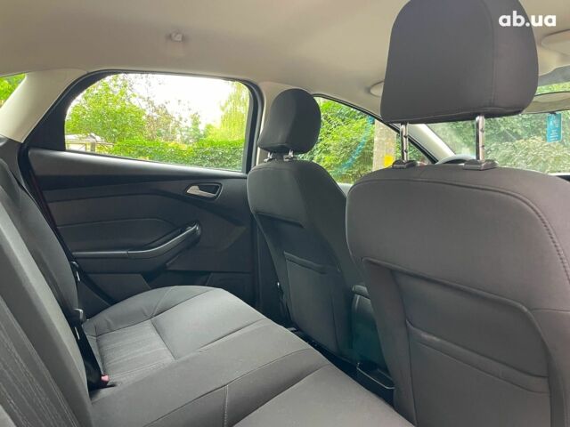 Красный Форд Фокус, объемом двигателя 2 л и пробегом 248 тыс. км за 6490 $, фото 20 на Automoto.ua