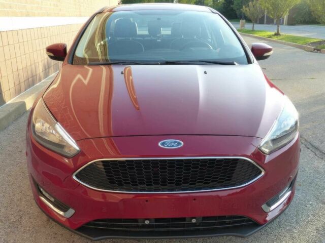 Красный Форд Фокус, объемом двигателя 2 л и пробегом 122 тыс. км за 6350 $, фото 1 на Automoto.ua