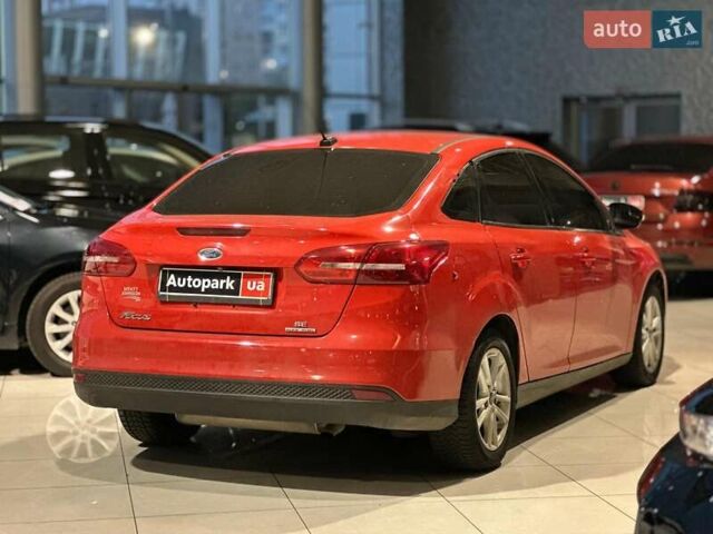 Червоний Форд Фокус, об'ємом двигуна 2 л та пробігом 162 тис. км за 9490 $, фото 1 на Automoto.ua