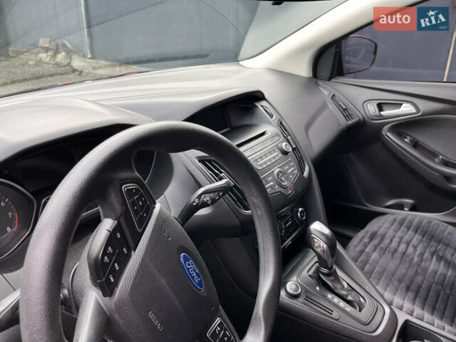 Красный Форд Фокус, объемом двигателя 2 л и пробегом 124 тыс. км за 8300 $, фото 6 на Automoto.ua