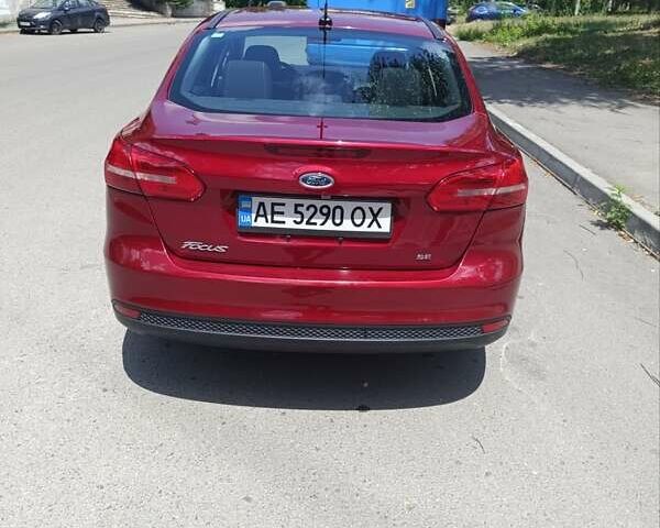 Червоний Форд Фокус, об'ємом двигуна 2 л та пробігом 126 тис. км за 8300 $, фото 4 на Automoto.ua