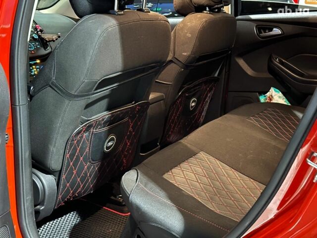 Червоний Форд Фокус, об'ємом двигуна 2 л та пробігом 162 тис. км за 9490 $, фото 10 на Automoto.ua