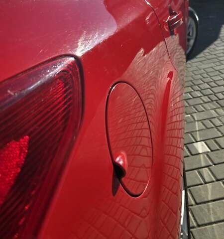 Червоний Форд Фокус, об'ємом двигуна 2 л та пробігом 162 тис. км за 9000 $, фото 2 на Automoto.ua