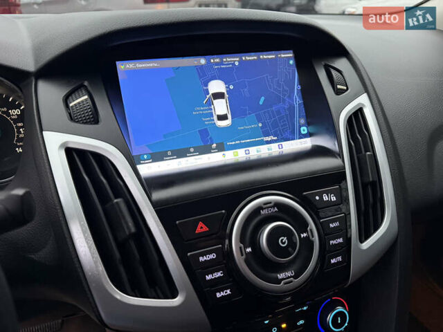 Червоний Форд Фокус, об'ємом двигуна 2 л та пробігом 92 тис. км за 7900 $, фото 42 на Automoto.ua