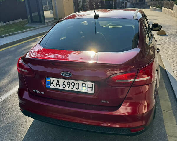 Красный Форд Фокус, объемом двигателя 2 л и пробегом 143 тыс. км за 9900 $, фото 17 на Automoto.ua