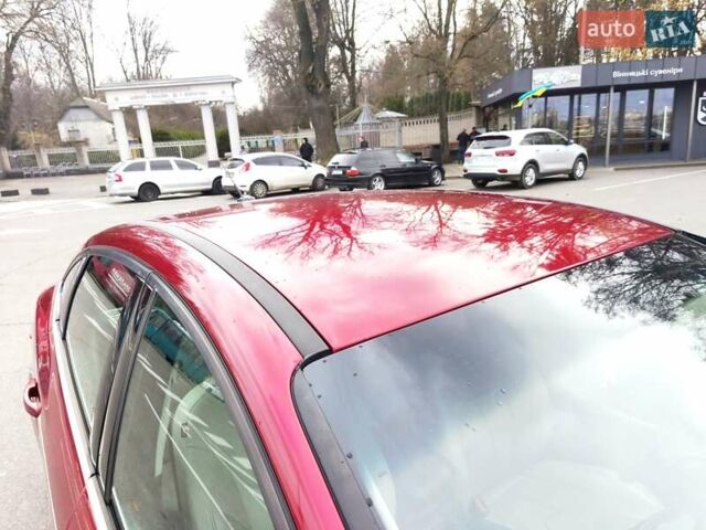 Красный Форд Фокус, объемом двигателя 2 л и пробегом 198 тыс. км за 10500 $, фото 3 на Automoto.ua