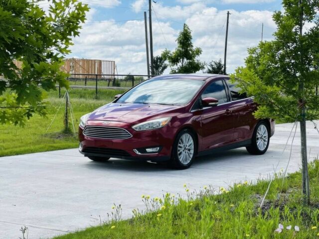 Красный Форд Фокус, объемом двигателя 2 л и пробегом 74 тыс. км за 6950 $, фото 1 на Automoto.ua