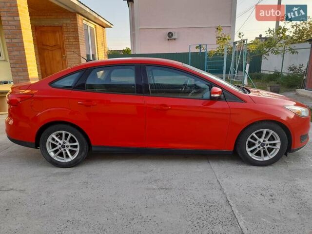 Червоний Форд Фокус, об'ємом двигуна 2 л та пробігом 176 тис. км за 9500 $, фото 1 на Automoto.ua