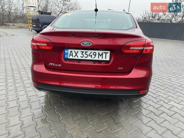 Красный Форд Фокус, объемом двигателя 2 л и пробегом 123 тыс. км за 8250 $, фото 4 на Automoto.ua