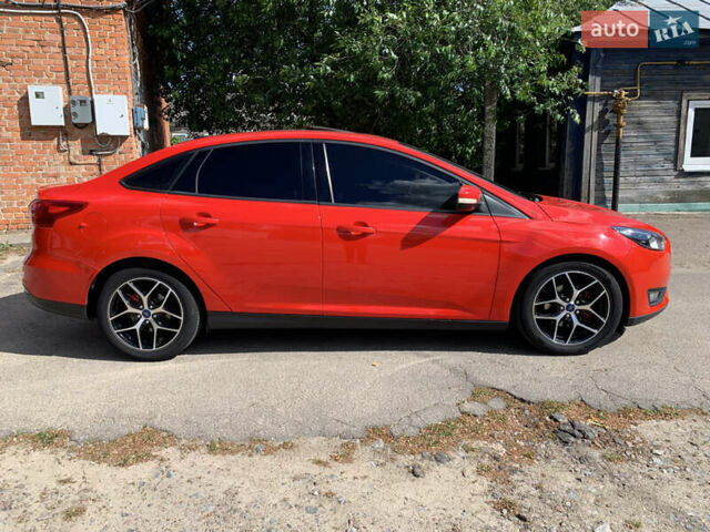 Красный Форд Фокус, объемом двигателя 2 л и пробегом 149 тыс. км за 10000 $, фото 6 на Automoto.ua