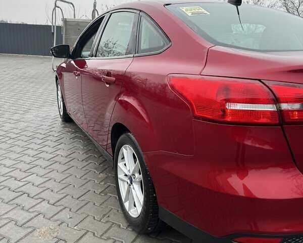 Красный Форд Фокус, объемом двигателя 2 л и пробегом 123 тыс. км за 8250 $, фото 13 на Automoto.ua