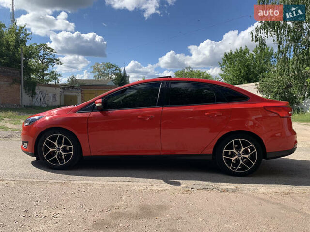 Красный Форд Фокус, объемом двигателя 2 л и пробегом 149 тыс. км за 10000 $, фото 5 на Automoto.ua