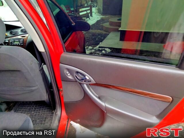 Красный Форд Фокус, объемом двигателя 1.8 л и пробегом 1 тыс. км за 3400 $, фото 6 на Automoto.ua