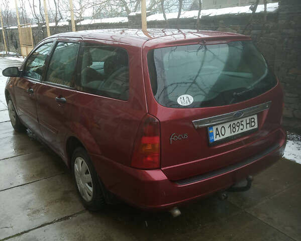 Красный Форд Фокус, объемом двигателя 1.9 л и пробегом 320 тыс. км за 2500 $, фото 3 на Automoto.ua