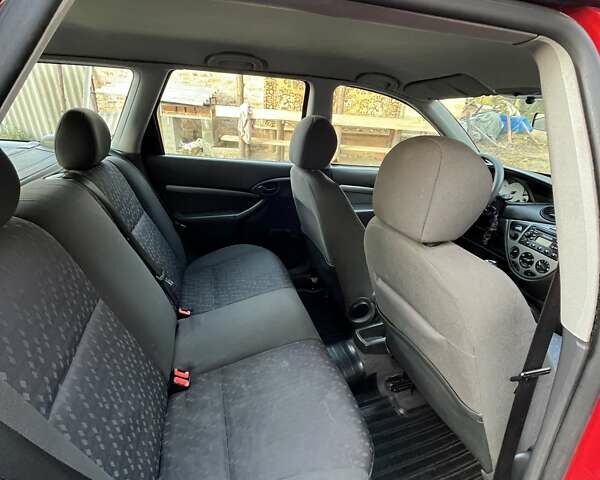 Красный Форд Фокус, объемом двигателя 1.75 л и пробегом 285 тыс. км за 2950 $, фото 20 на Automoto.ua