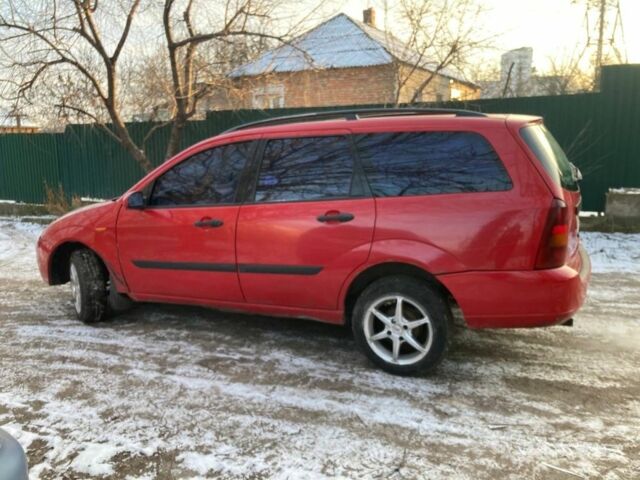 Красный Форд Фокус, объемом двигателя 1.6 л и пробегом 223 тыс. км за 1400 $, фото 2 на Automoto.ua