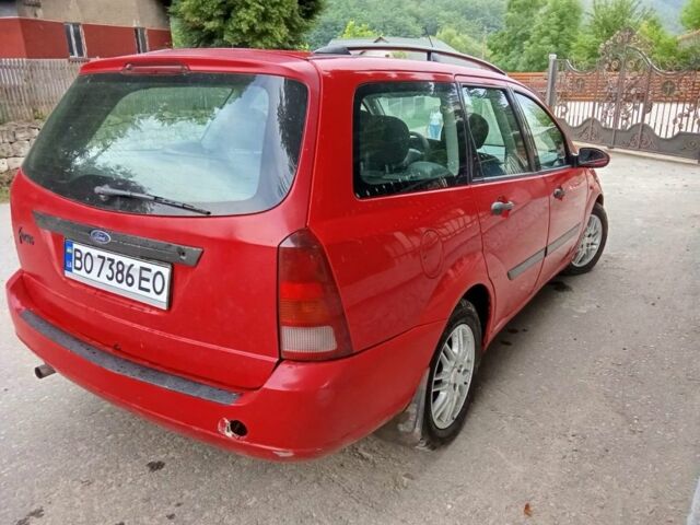 Красный Форд Фокус, объемом двигателя 1.6 л и пробегом 320 тыс. км за 2400 $, фото 5 на Automoto.ua