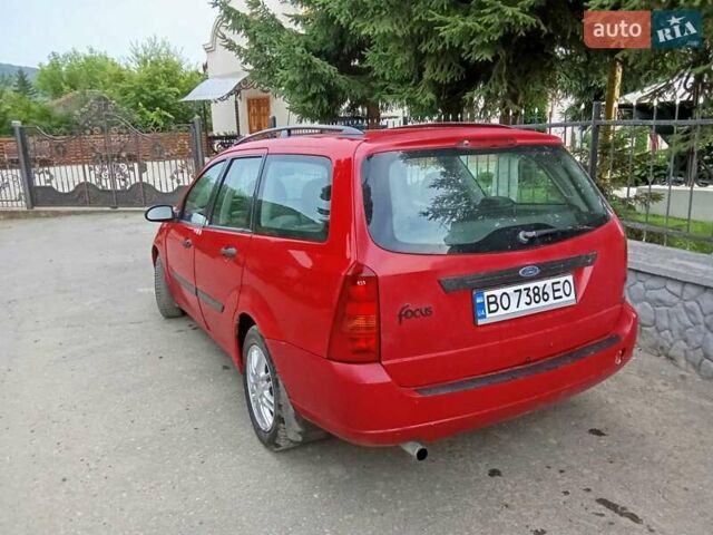 Красный Форд Фокус, объемом двигателя 1.6 л и пробегом 323 тыс. км за 2800 $, фото 5 на Automoto.ua