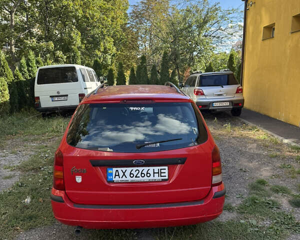 Красный Форд Фокус, объемом двигателя 1.8 л и пробегом 223 тыс. км за 2950 $, фото 3 на Automoto.ua