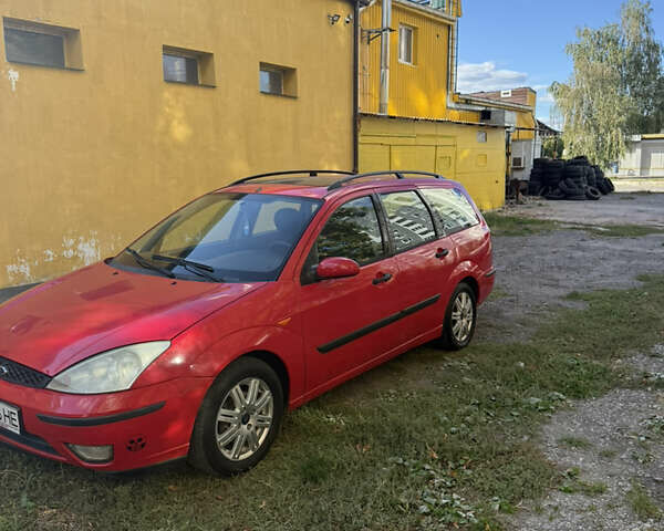 Красный Форд Фокус, объемом двигателя 1.8 л и пробегом 223 тыс. км за 2950 $, фото 1 на Automoto.ua