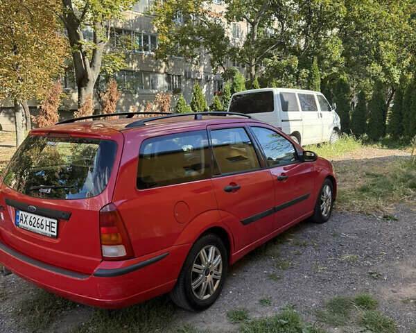 Красный Форд Фокус, объемом двигателя 1.8 л и пробегом 223 тыс. км за 2950 $, фото 4 на Automoto.ua