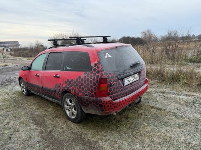 Красный Форд Фокус, объемом двигателя 1.8 л и пробегом 350 тыс. км за 999 $, фото 2 на Automoto.ua