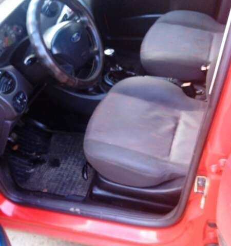 Красный Форд Фокус, объемом двигателя 1.8 л и пробегом 223 тыс. км за 3500 $, фото 4 на Automoto.ua