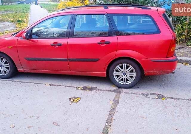 Красный Форд Фокус, объемом двигателя 1.8 л и пробегом 223 тыс. км за 3500 $, фото 9 на Automoto.ua