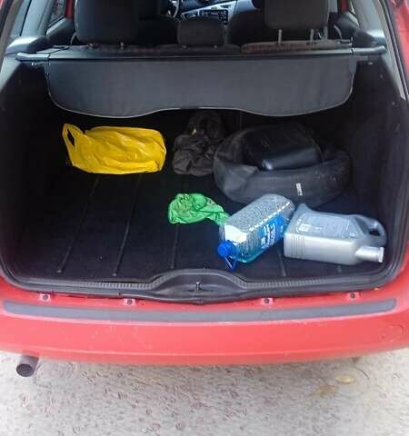 Красный Форд Фокус, объемом двигателя 1.8 л и пробегом 223 тыс. км за 3500 $, фото 7 на Automoto.ua