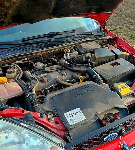 Червоний Форд Фокус, об'ємом двигуна 1.8 л та пробігом 235 тис. км за 4200 $, фото 10 на Automoto.ua