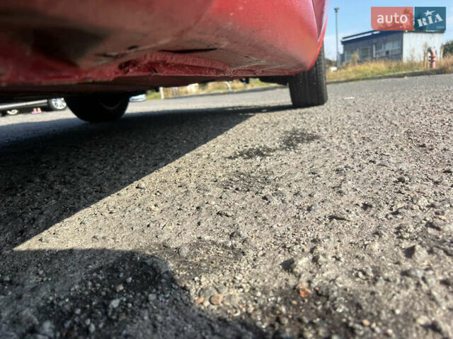 Красный Форд Фокус, объемом двигателя 1.6 л и пробегом 264 тыс. км за 4900 $, фото 12 на Automoto.ua