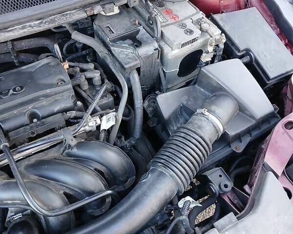 Червоний Форд Фокус, об'ємом двигуна 1.6 л та пробігом 260 тис. км за 4700 $, фото 18 на Automoto.ua