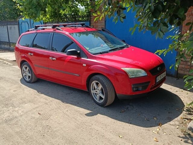 Красный Форд Фокус, объемом двигателя 1.6 л и пробегом 295 тыс. км за 3950 $, фото 1 на Automoto.ua