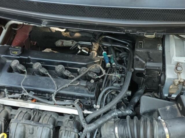 Красный Форд Фокус, объемом двигателя 1.8 л и пробегом 247 тыс. км за 4300 $, фото 7 на Automoto.ua