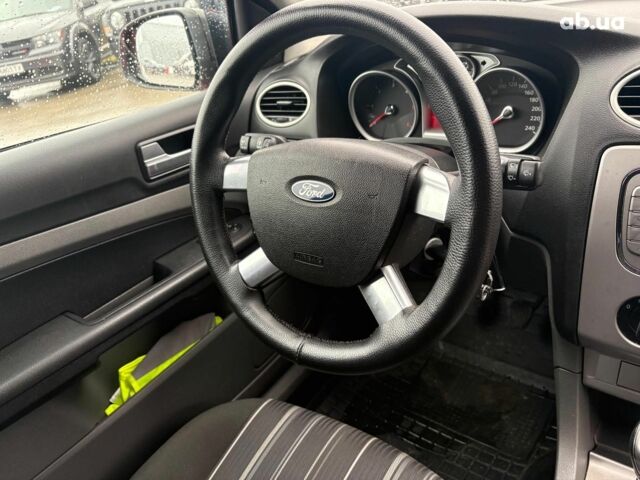 Красный Форд Фокус, объемом двигателя 1.6 л и пробегом 206 тыс. км за 4540 $, фото 26 на Automoto.ua
