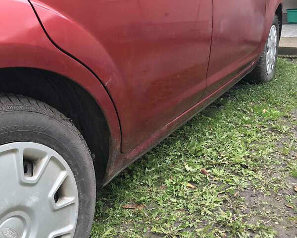 Красный Форд Фокус, объемом двигателя 1.56 л и пробегом 167 тыс. км за 4500 $, фото 4 на Automoto.ua