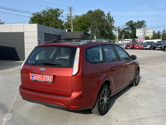 Червоний Форд Фокус, об'ємом двигуна 2 л та пробігом 161 тис. км за 7000 $, фото 4 на Automoto.ua