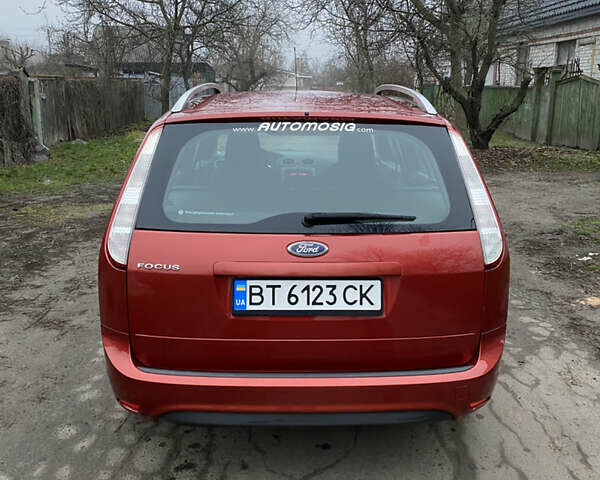 Красный Форд Фокус, объемом двигателя 1.8 л и пробегом 179 тыс. км за 5500 $, фото 7 на Automoto.ua